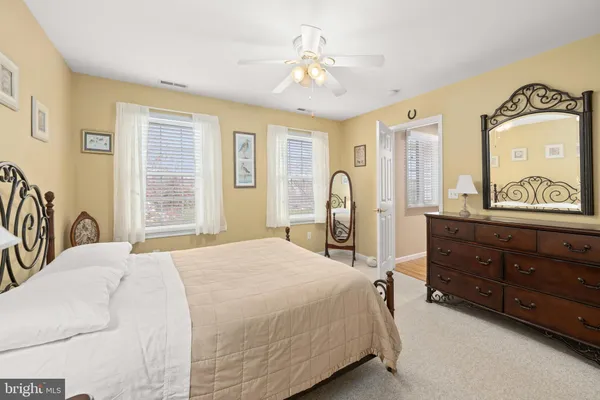 a view of front door and porch with seating space