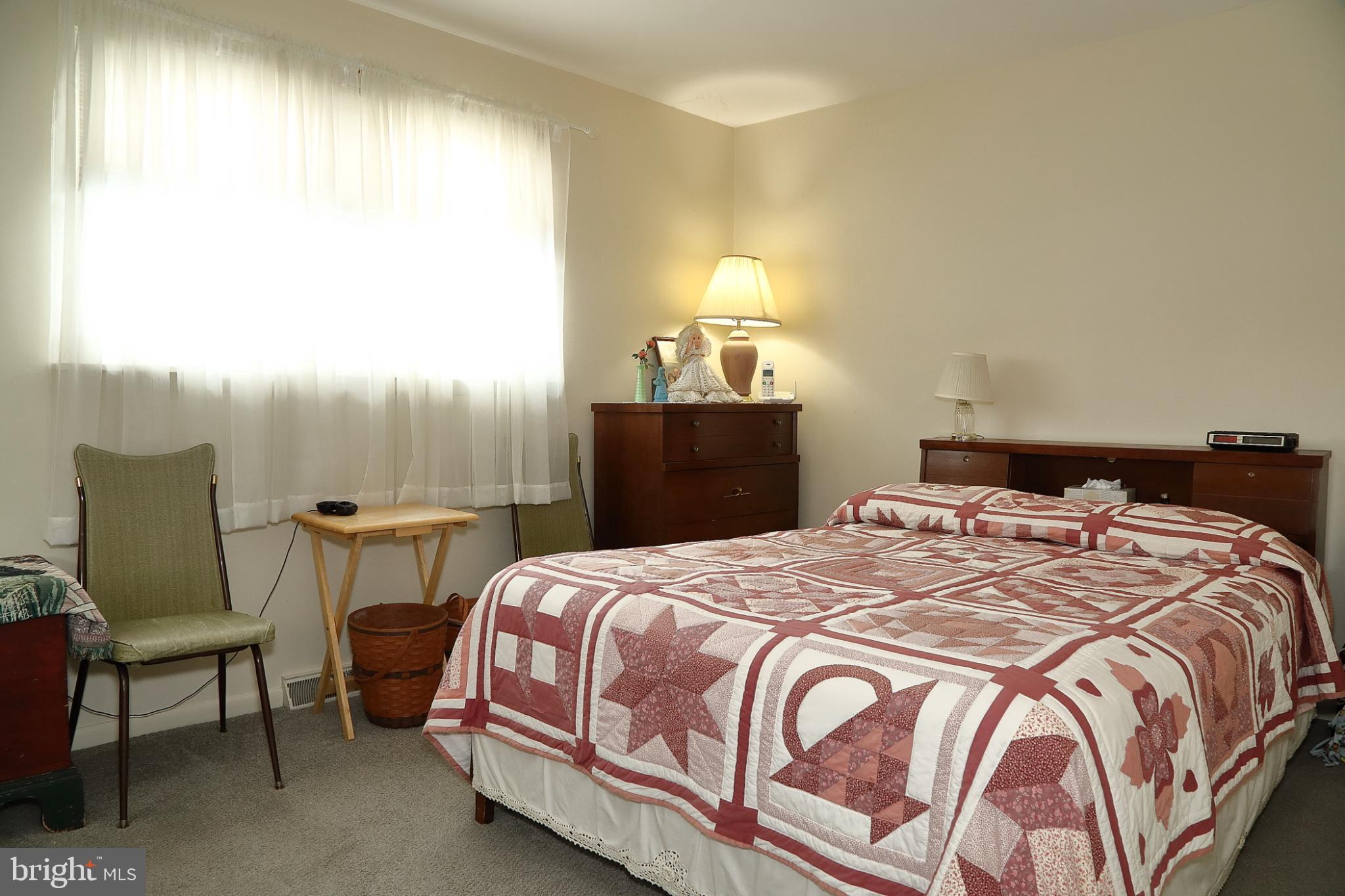 213 North Locust Street Lititz, PA 17543 - Photo 13 of 22 Cozy bedroom with warm, inviting light.