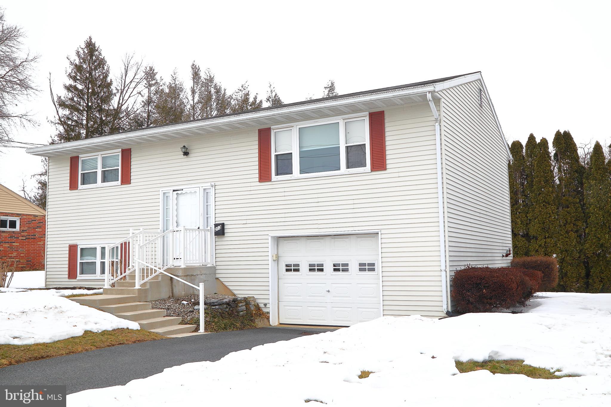 213 North Locust Street Lititz, PA 17543 - Photo 2 of 22 Charming split-level home with winter backdrop.