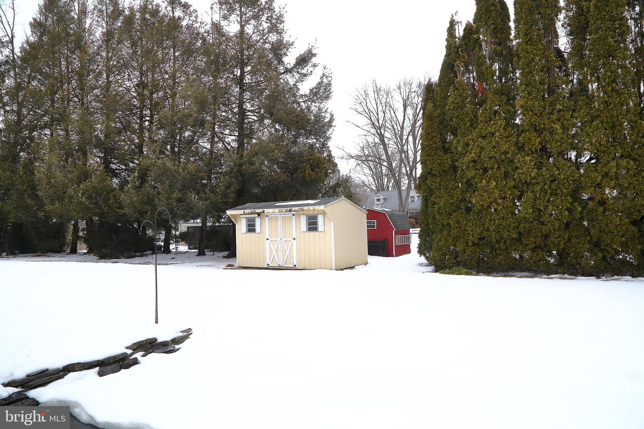 213 North Locust Street Lititz, PA 17543 - Photo 21 of 22 Charming sheds nestled in a snowy landscape.