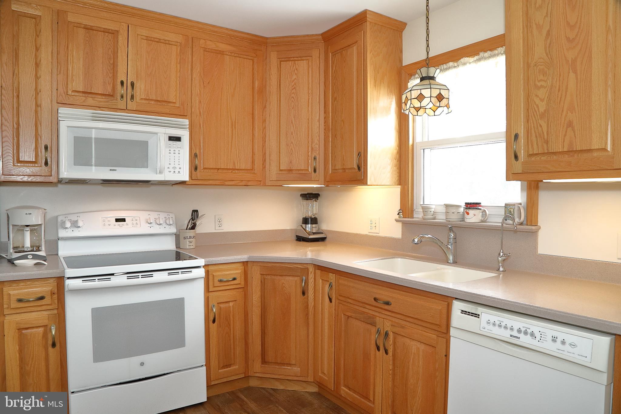 213 North Locust Street Lititz, PA 17543 - Photo 3 of 22 Warm oak kitchen with modern appliances.