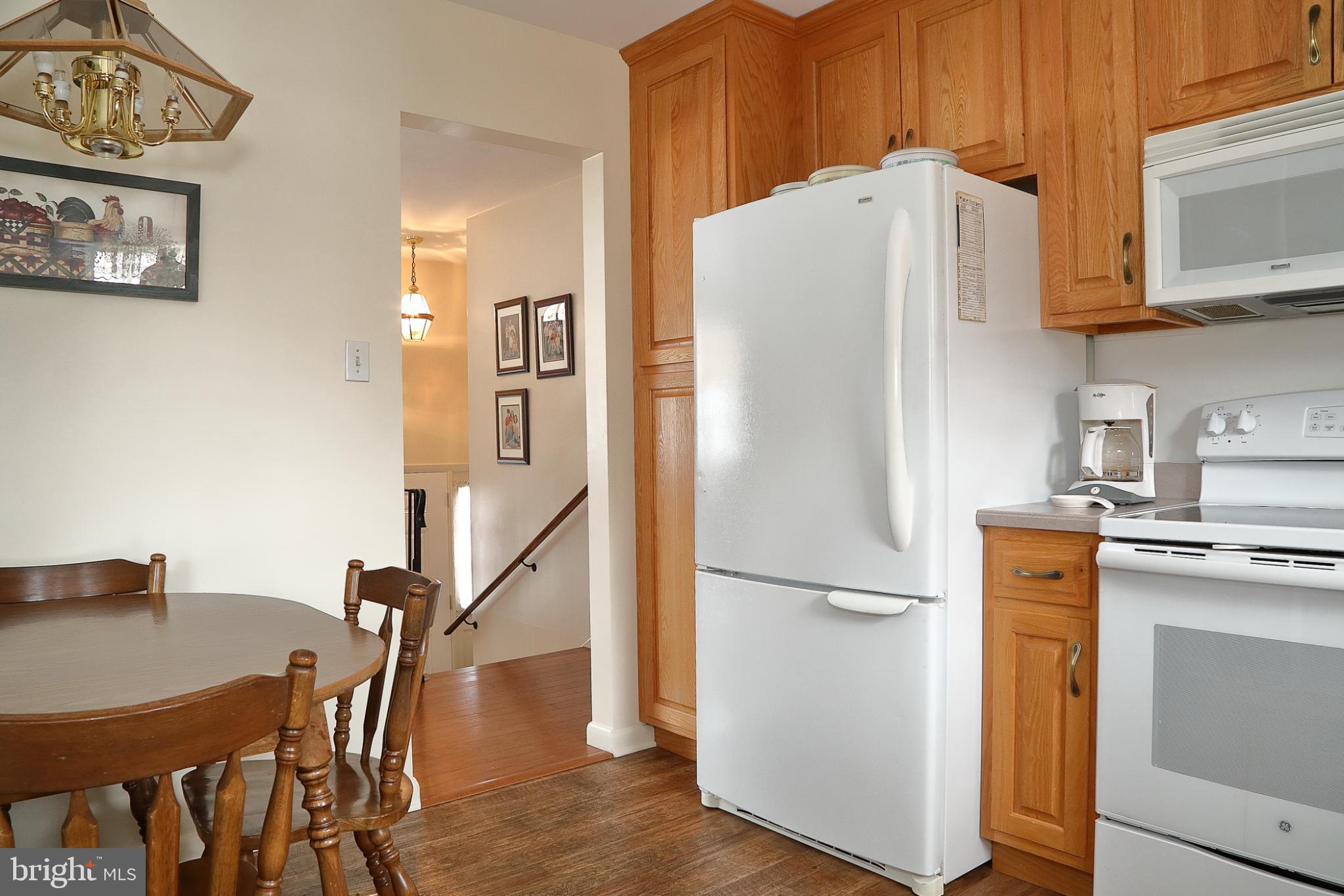 213 North Locust Street Lititz, PA 17543 - Photo 4 of 22 Cozy kitchen with warm wooden accents.