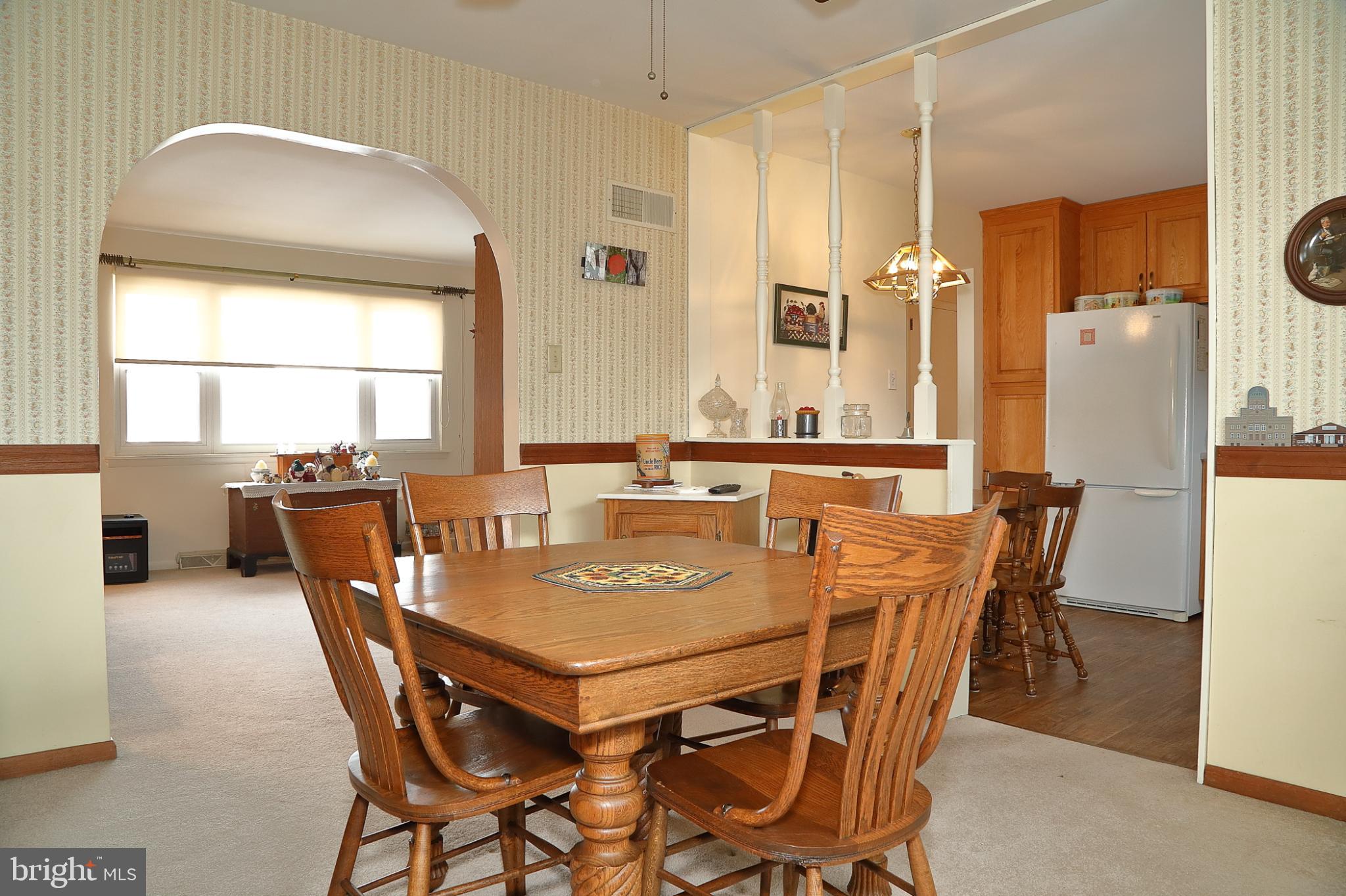 213 North Locust Street Lititz, PA 17543 - Photo 7 of 22 Cozy dining area with inviting ambiance.