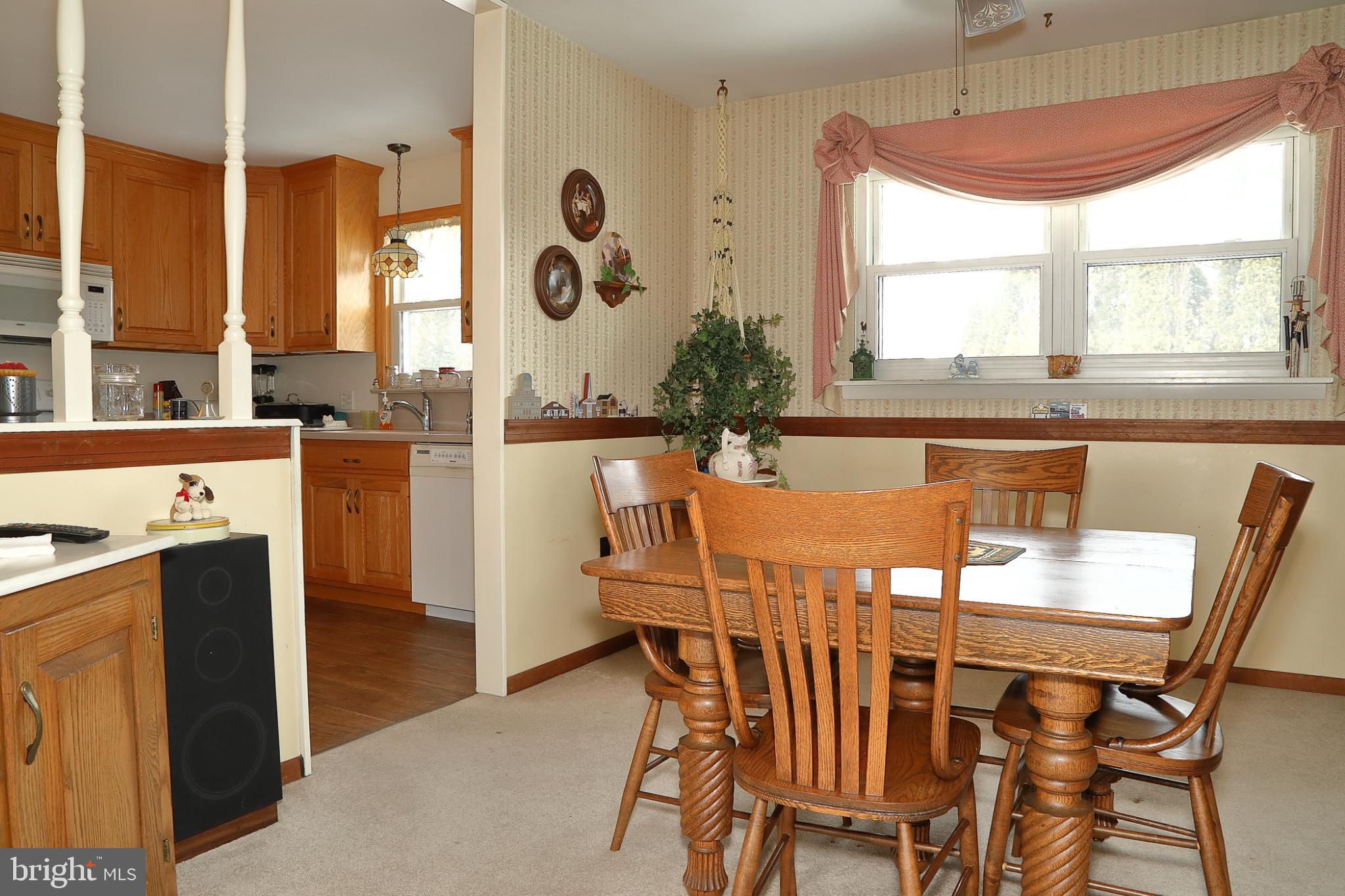 213 North Locust Street Lititz, PA 17543 - Photo 8 of 22 Cozy kitchen with warm wooden accents.