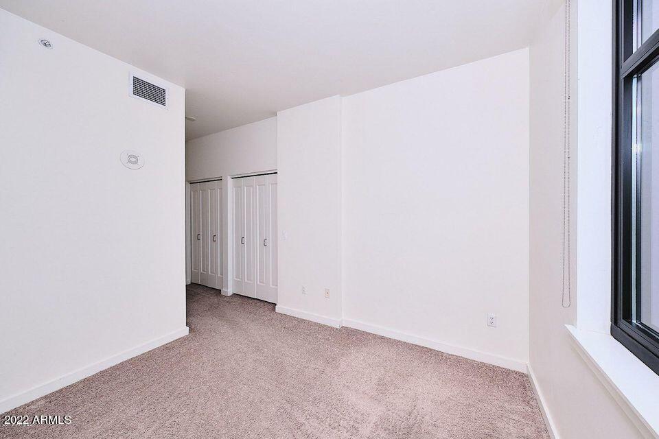 310 South 4th Street, Unit 605 Phoenix, AZ 85004 - Photo 19 of 26 a view of an empty room
