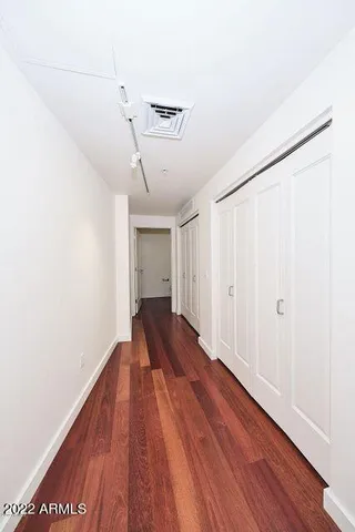 a view of entryway with wooden floor