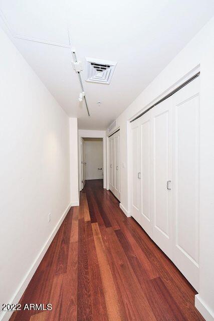 310 South 4th Street, Unit 605 Phoenix, AZ 85004 - Photo 22 of 26 a view of entryway with wooden floor