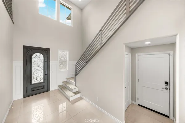 a view of an entryway with front door