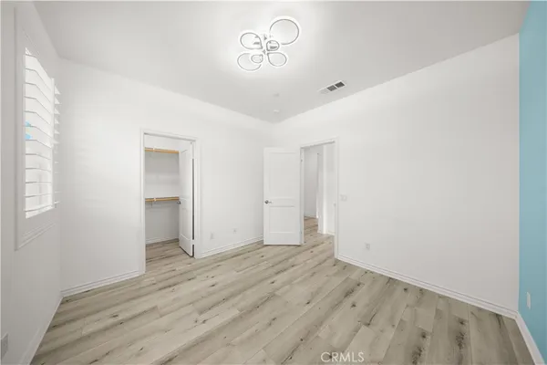 a view of an entryway with a room