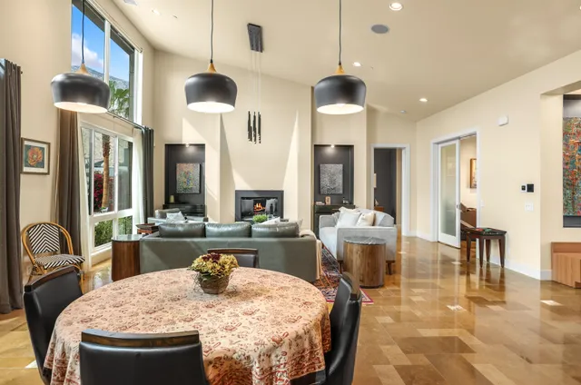 a view of a patio with swimming pool table and chairs