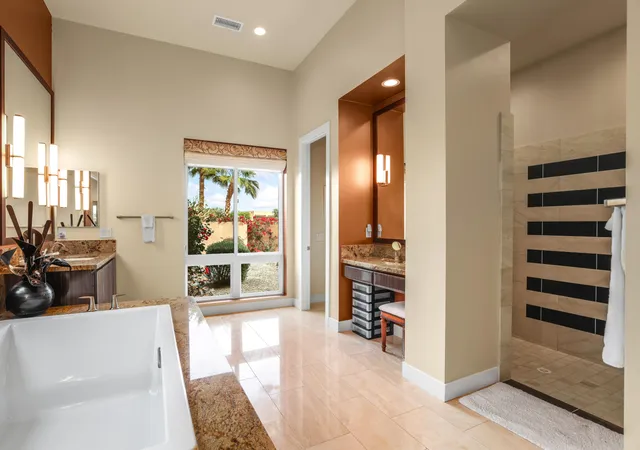 a bedroom with a bed and a desk