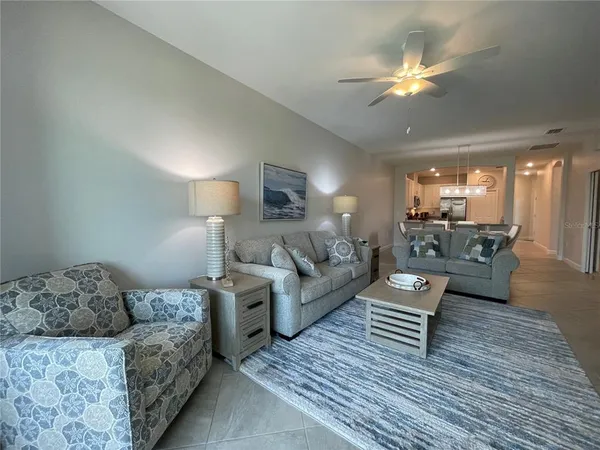 a bedroom with a large bed and a dresser