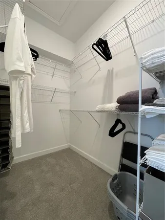 an aerial view of a house with a swimming pool yard and outdoor seating