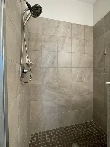 a view of a dining area with furniture and wooden floor