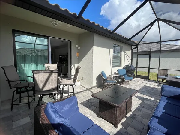 a bedroom with a bed and a table in it