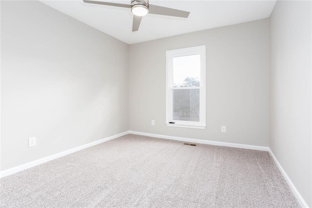 3162 Hadrian Court Powder Springs, GA 30127 - Photo 21 of 49 an empty room with a window