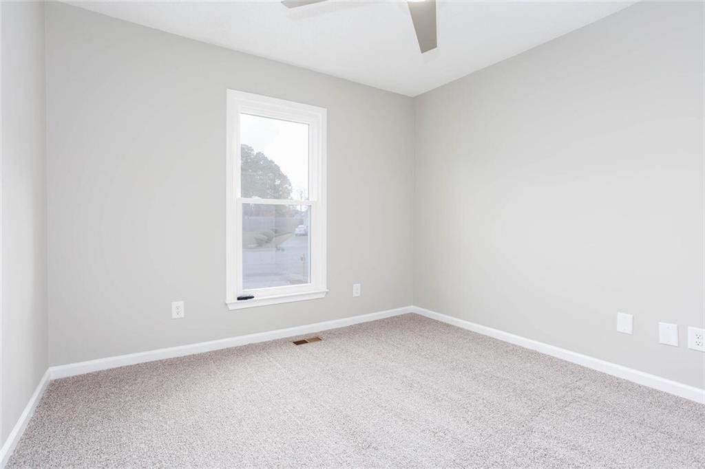 3162 Hadrian Court Powder Springs, GA 30127 - Photo 22 of 49 an empty room with a window