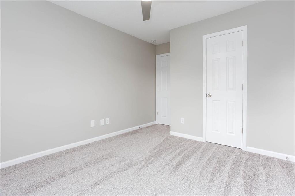3162 Hadrian Court Powder Springs, GA 30127 - Photo 23 of 49 an empty room with a empty space and windows