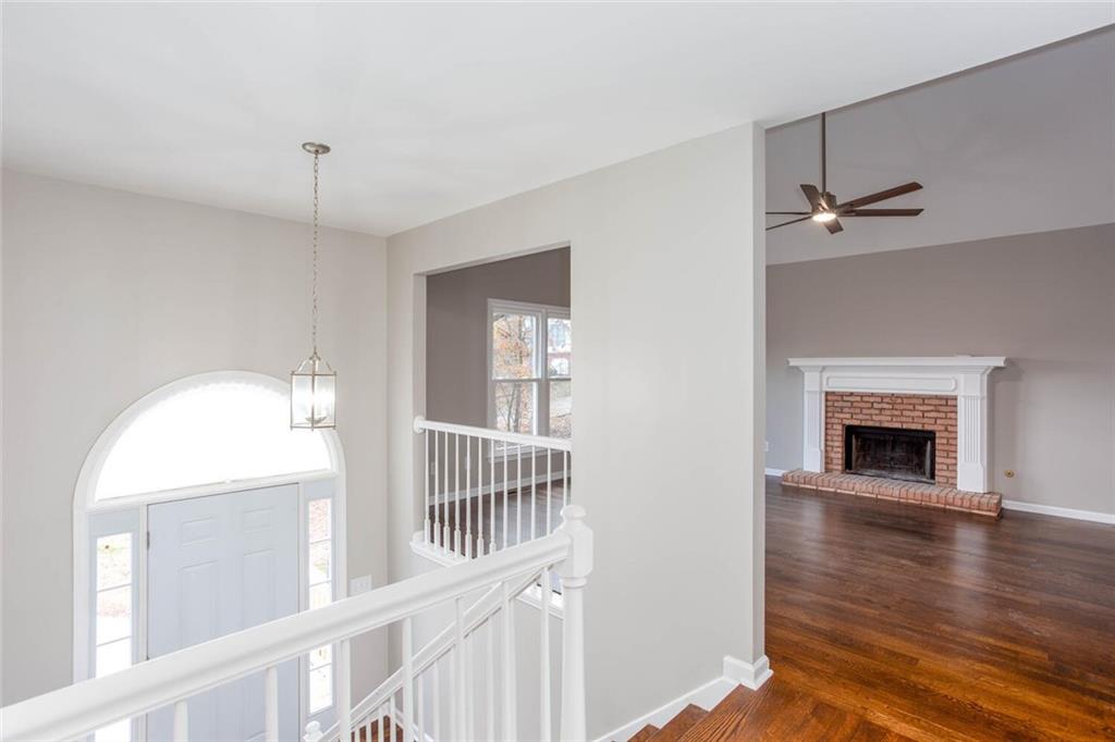 3162 Hadrian Court Powder Springs, GA 30127 - Photo 3 of 49 a view of an entryway with wooden floor