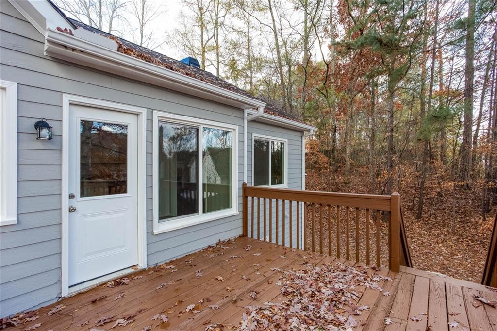 3162 Hadrian Court Powder Springs, GA 30127 - Photo 33 of 49 a view of a house with a wooden fence