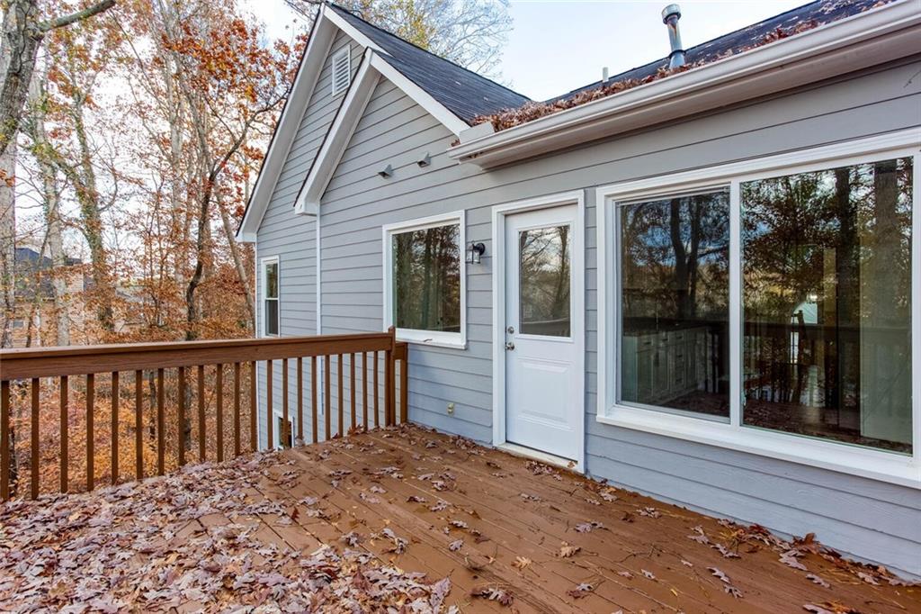 3162 Hadrian Court Powder Springs, GA 30127 - Photo 34 of 49 a view of a backyard with a large tree