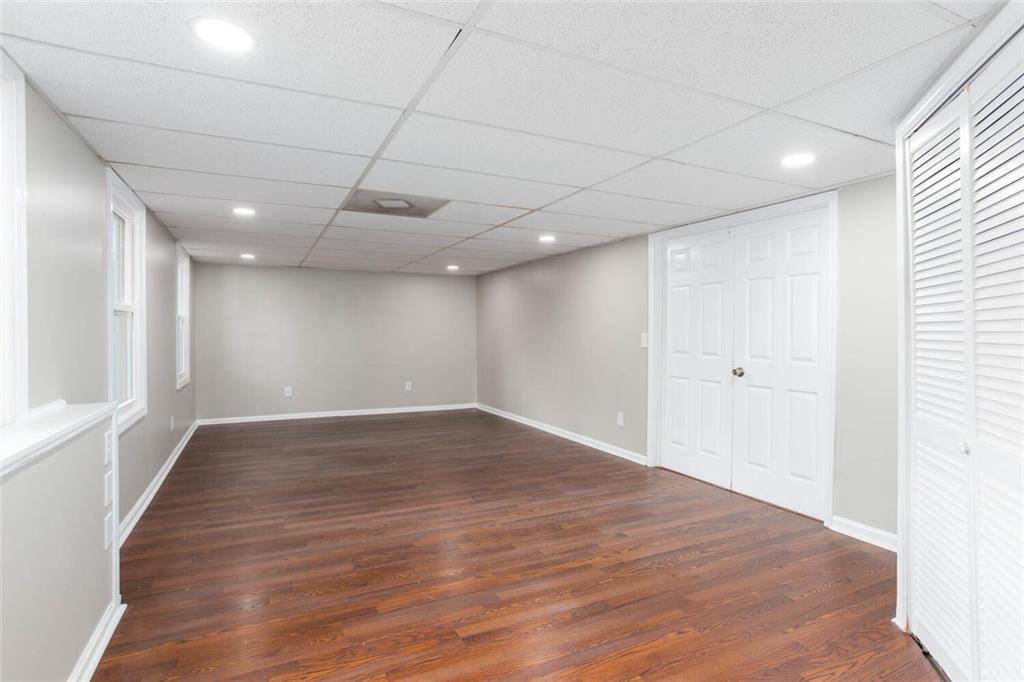 3162 Hadrian Court Powder Springs, GA 30127 - Photo 41 of 49 a view of empty room with wooden floor