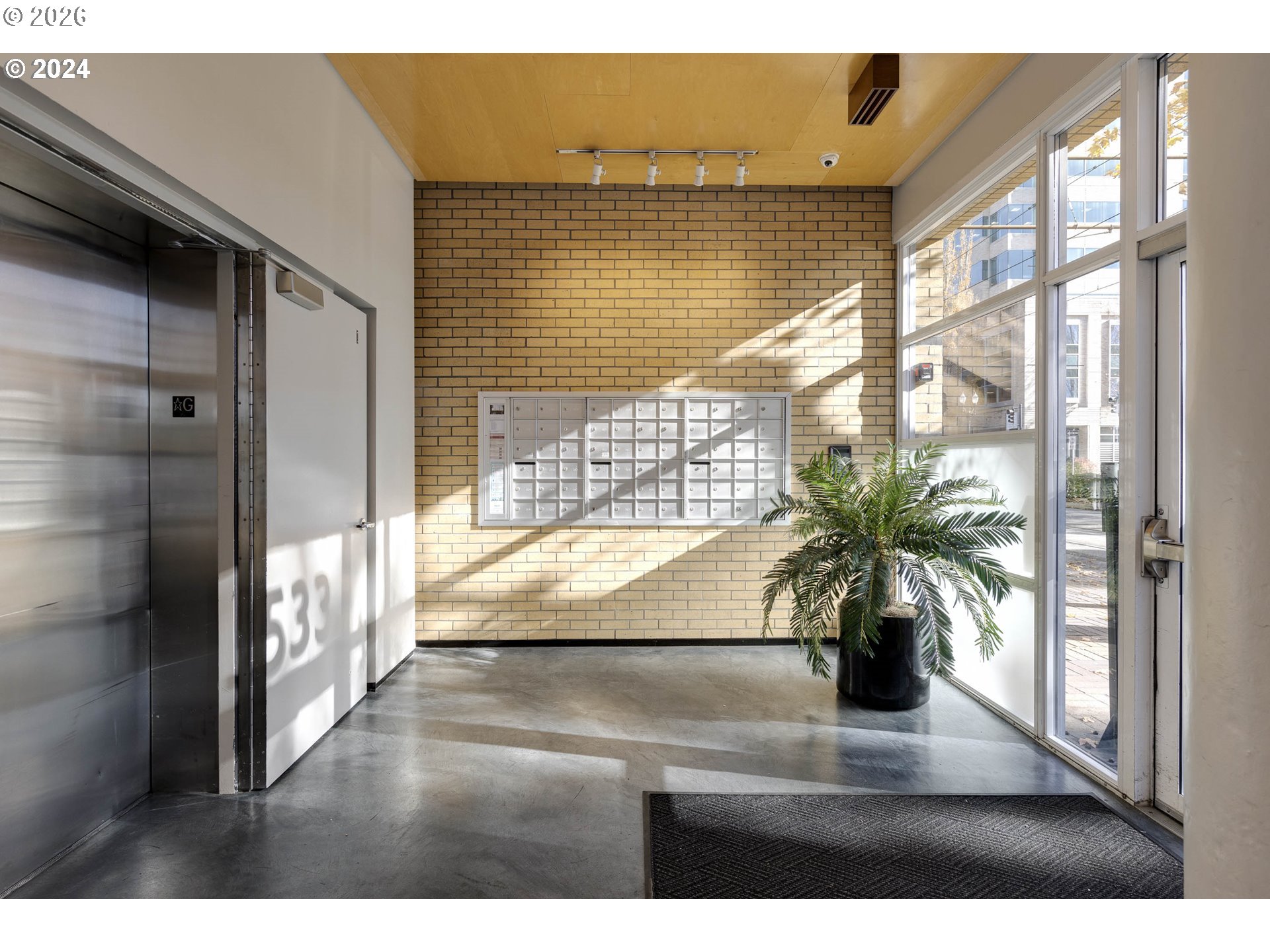 533 Northeast Holladay Street, Unit 409 Portland, OR 97232 - Photo 22 of 38 a view of living room and window