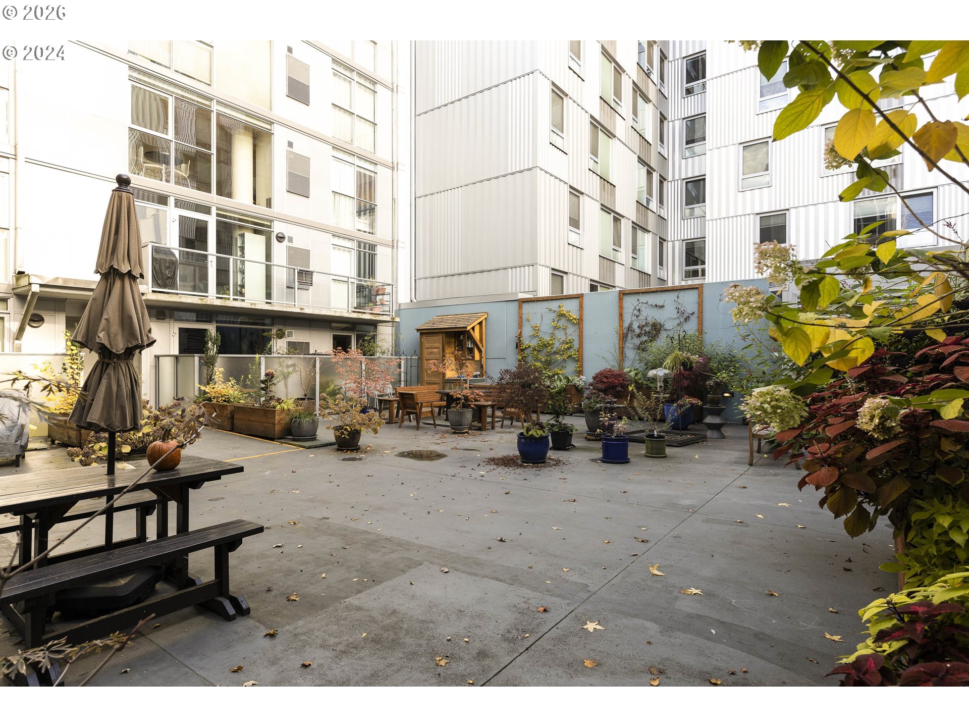 533 Northeast Holladay Street, Unit 409 Portland, OR 97232 - Photo 23 of 38 a group of cars parked in front of a building