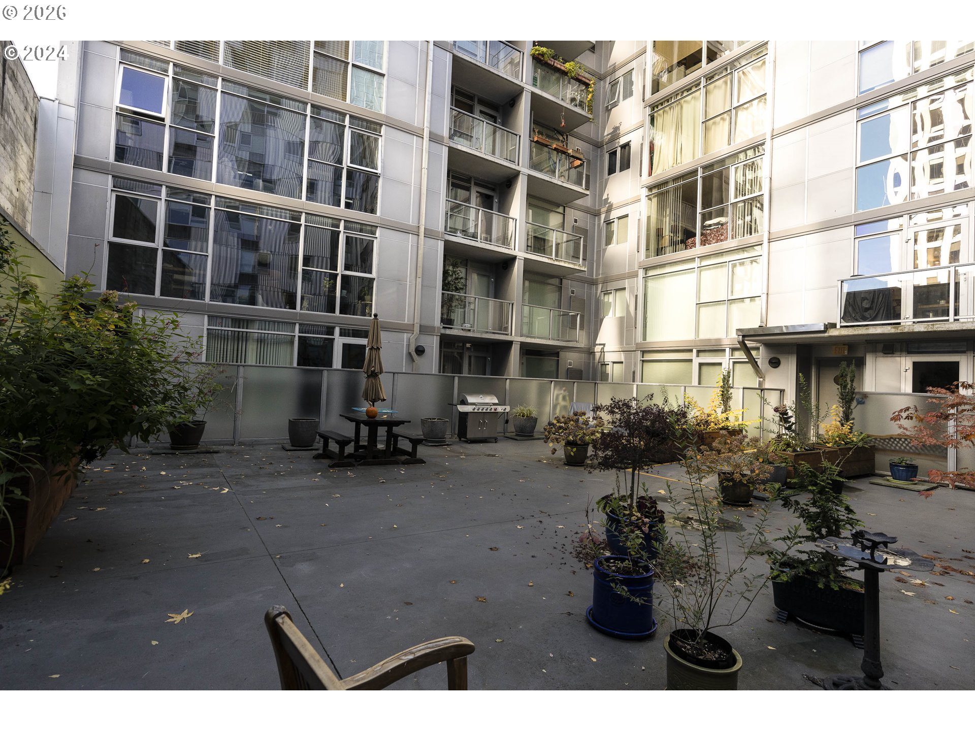 533 Northeast Holladay Street, Unit 409 Portland, OR 97232 - Photo 31 of 38 a view of a building with many windows