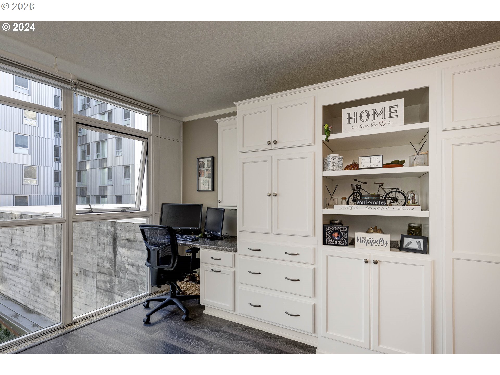 533 Northeast Holladay Street, Unit 409 Portland, OR 97232 - Photo 8 of 38 a view of a workspace with furniture
