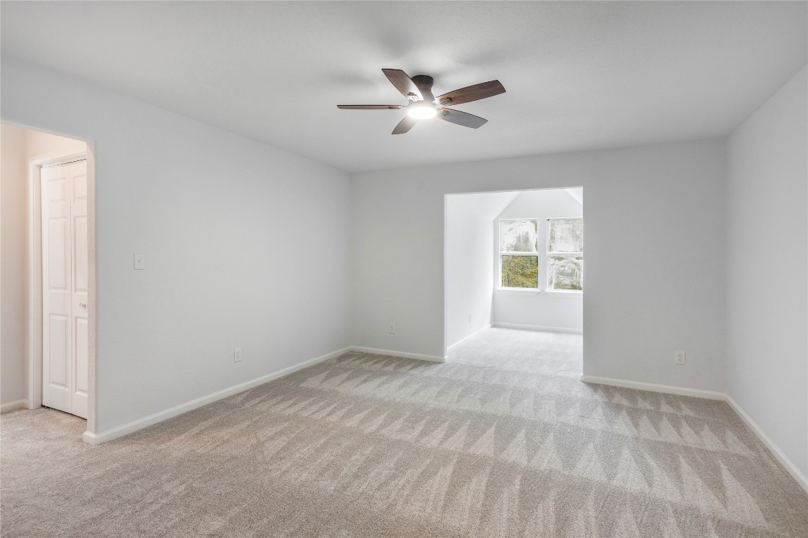 40111 Roundup Road Magnolia, TX 77354 - Photo 24 of 42 a view of an empty room with a window