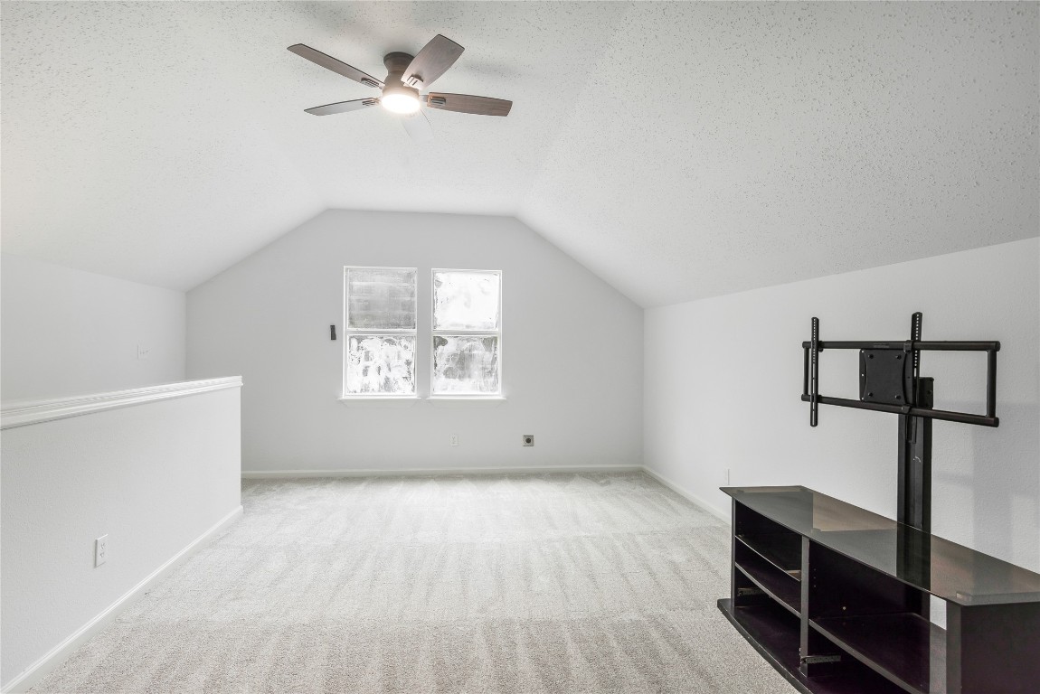 40111 Roundup Road Magnolia, TX 77354 - Photo 34 of 42 wooden floor in an empty room with a window