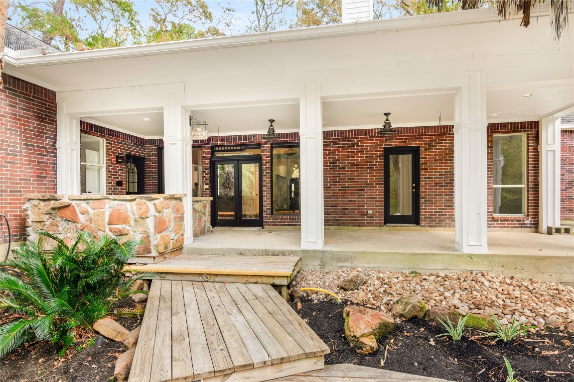 40111 Roundup Road Magnolia, TX 77354 - Photo 37 of 42 a front view of a house with a yard