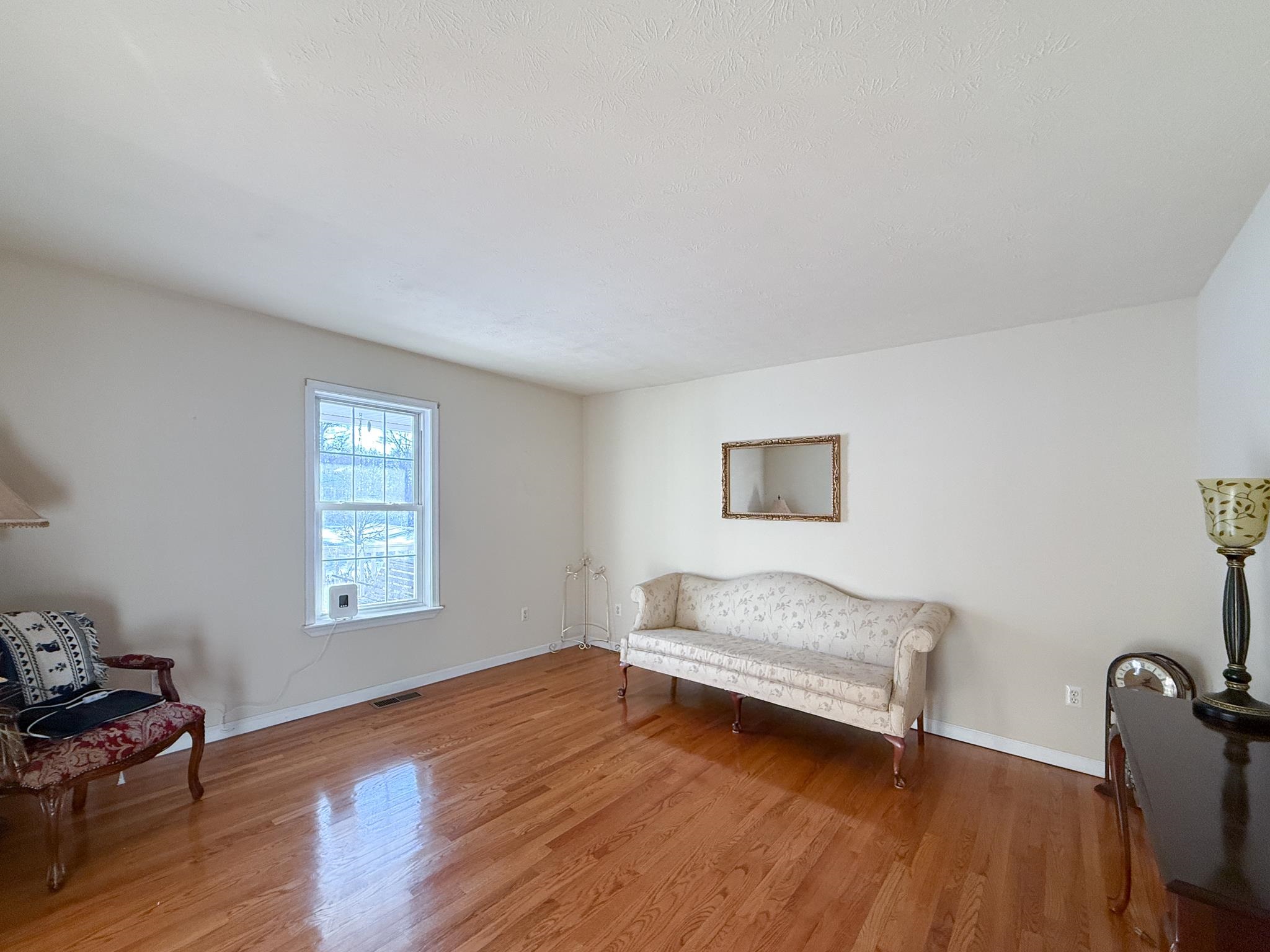 804 Oak Grove Church Road Waynesboro, VA 22980 - Photo 13 of 28 a living room with furniture and a window