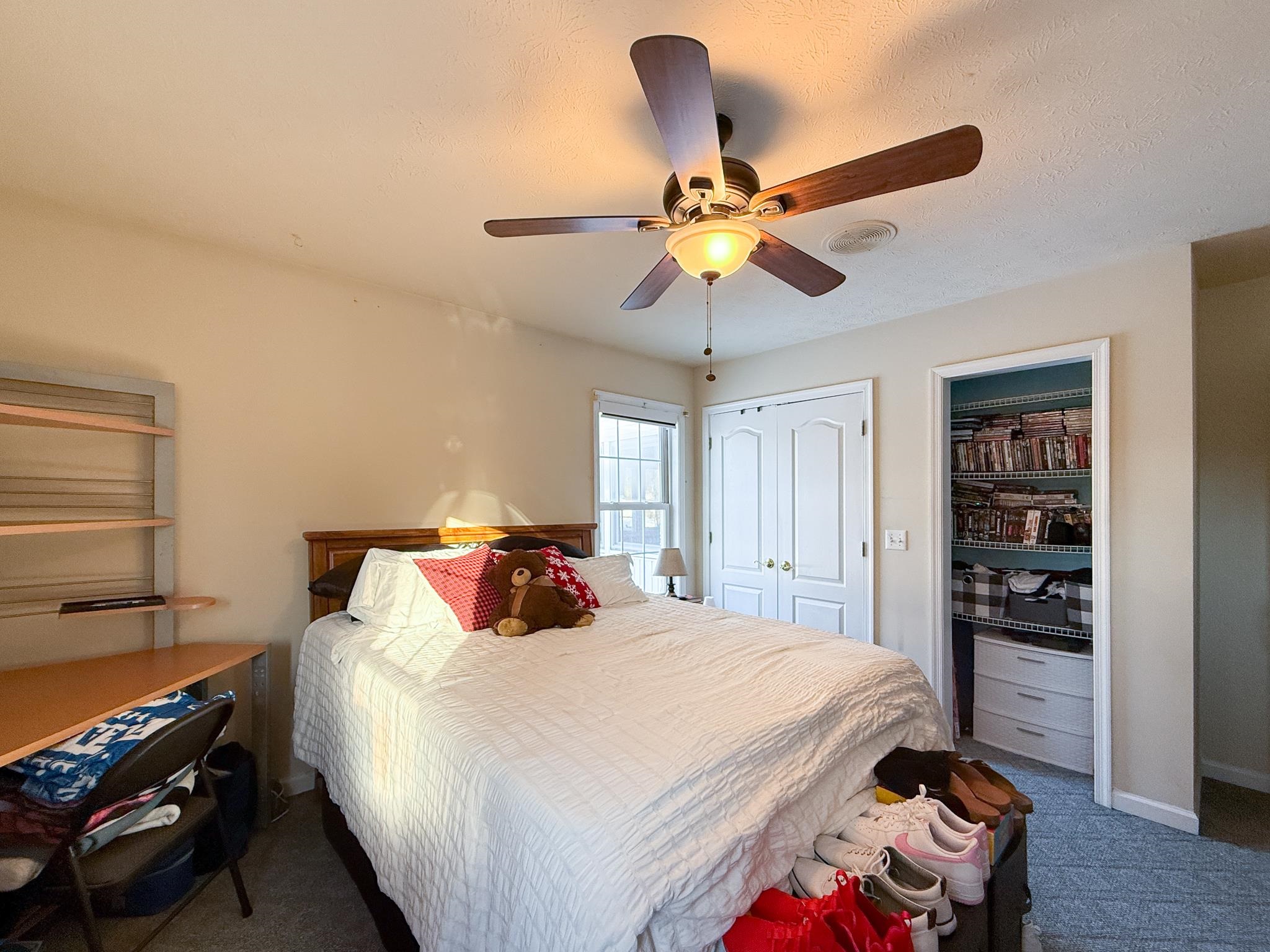 804 Oak Grove Church Road Waynesboro, VA 22980 - Photo 18 of 28 a bedroom with a bed and a chandelier