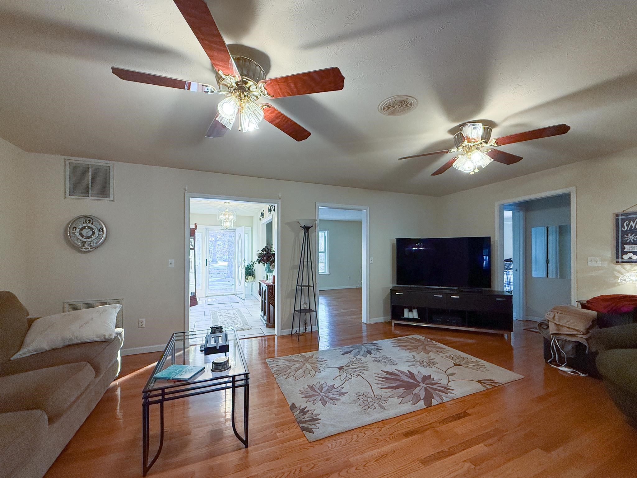 804 Oak Grove Church Road Waynesboro, VA 22980 - Photo 25 of 28 a living room with furniture and a flat screen tv