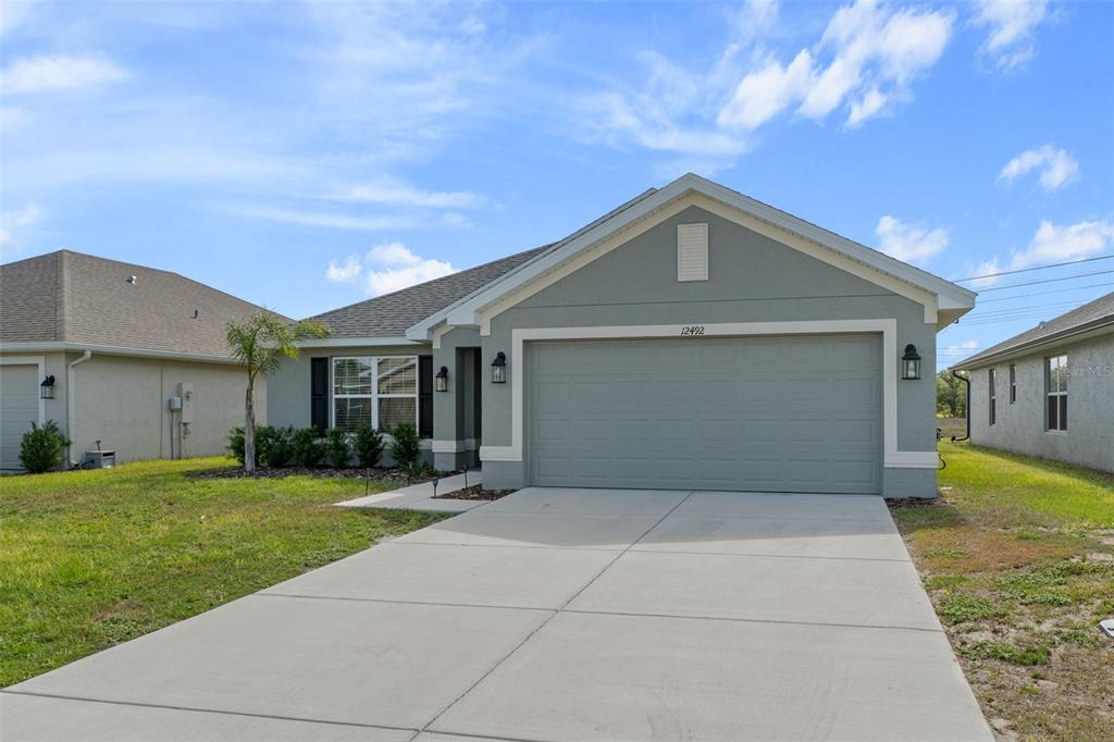 12492 Pine Bluff Street Spring Hill, FL 34609 - Photo 2 of 37