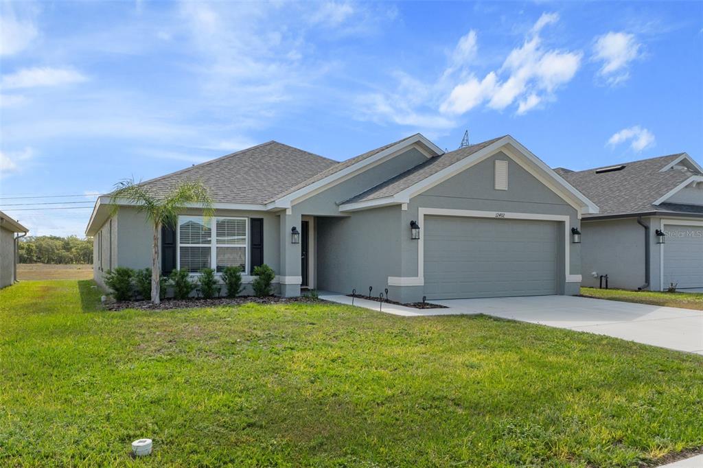 12492 Pine Bluff Street Spring Hill, FL 34609 - Photo 3 of 37