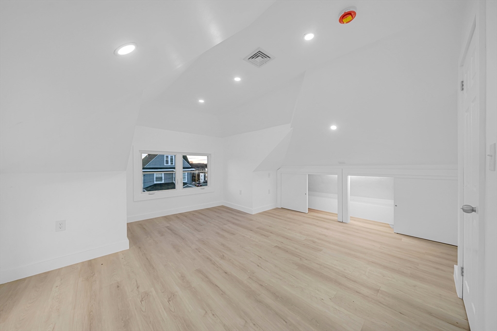 127 Henry Avenue, Unit 2B Lynn, MA 01902 - Photo 9 of 10 a view of an empty room with a window