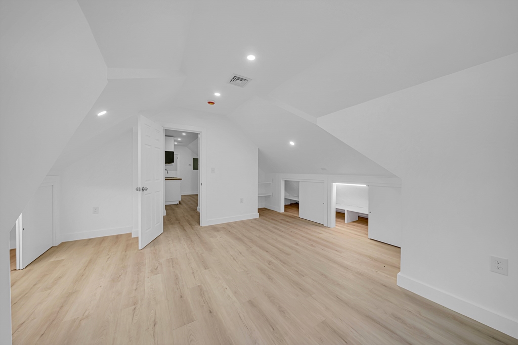 127 Henry Avenue, Unit 2B Lynn, MA 01902 - Photo 10 of 10 a view of empty room with wooden floor