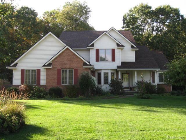 2330 Sunny Ridge Drive Pinckney, MI 48169 - Photo 1 of 21 1Front.jpg