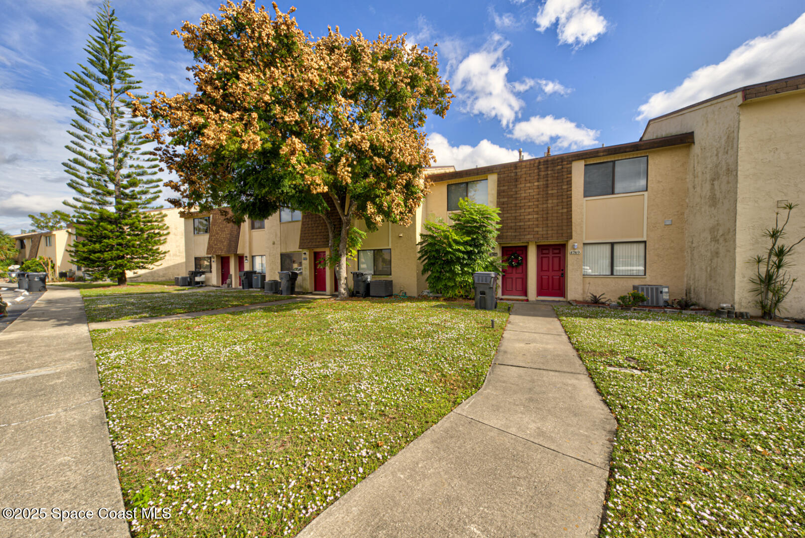 4749 Sisson Road Titusville, FL 32780 - Photo 2 of 30 walkway to unit