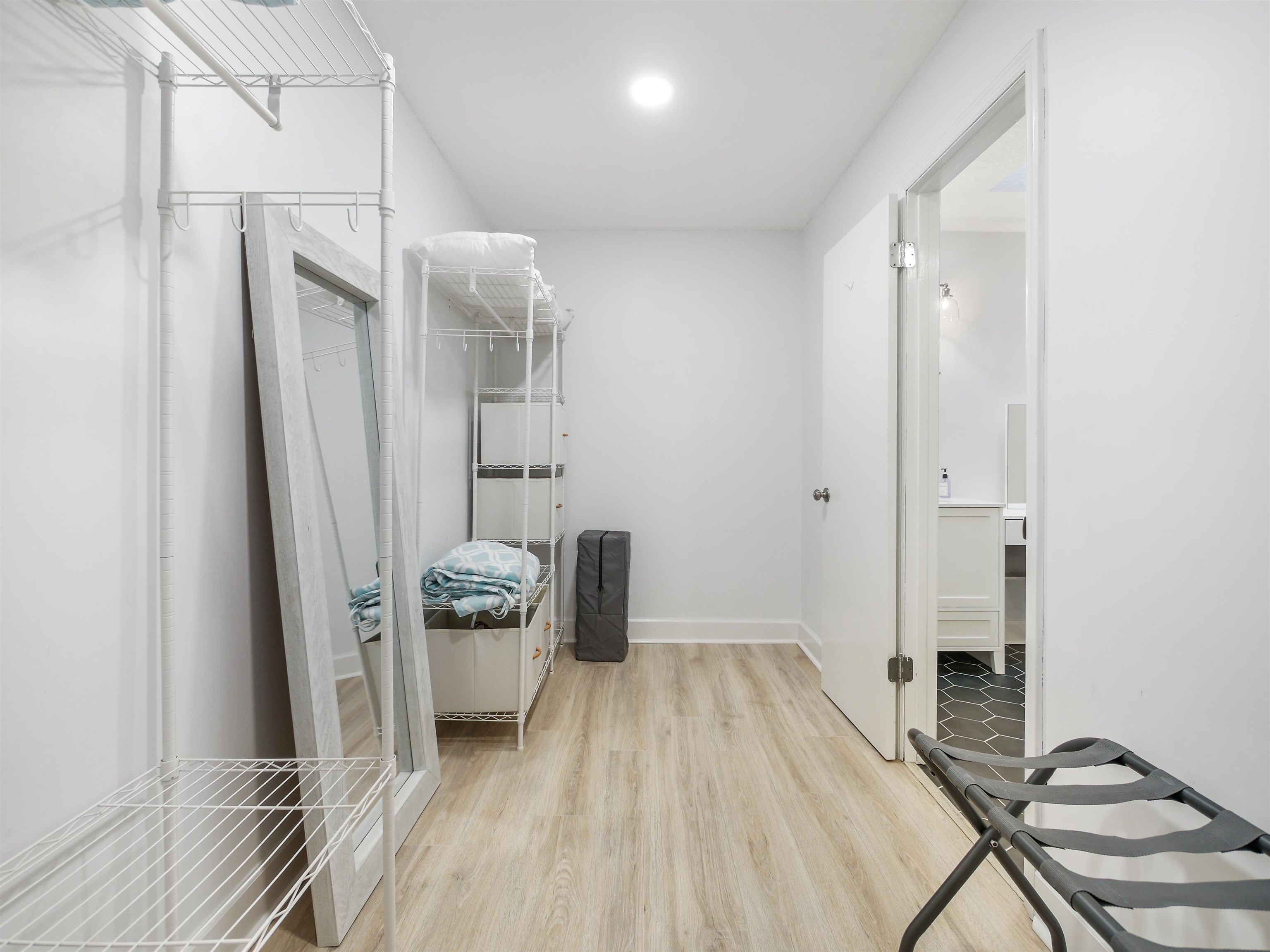 140 Hawthorne Road St. Augustine, FL 32086 - Photo 19 of 39 a bathroom with a sink a toilet a mirror and shower