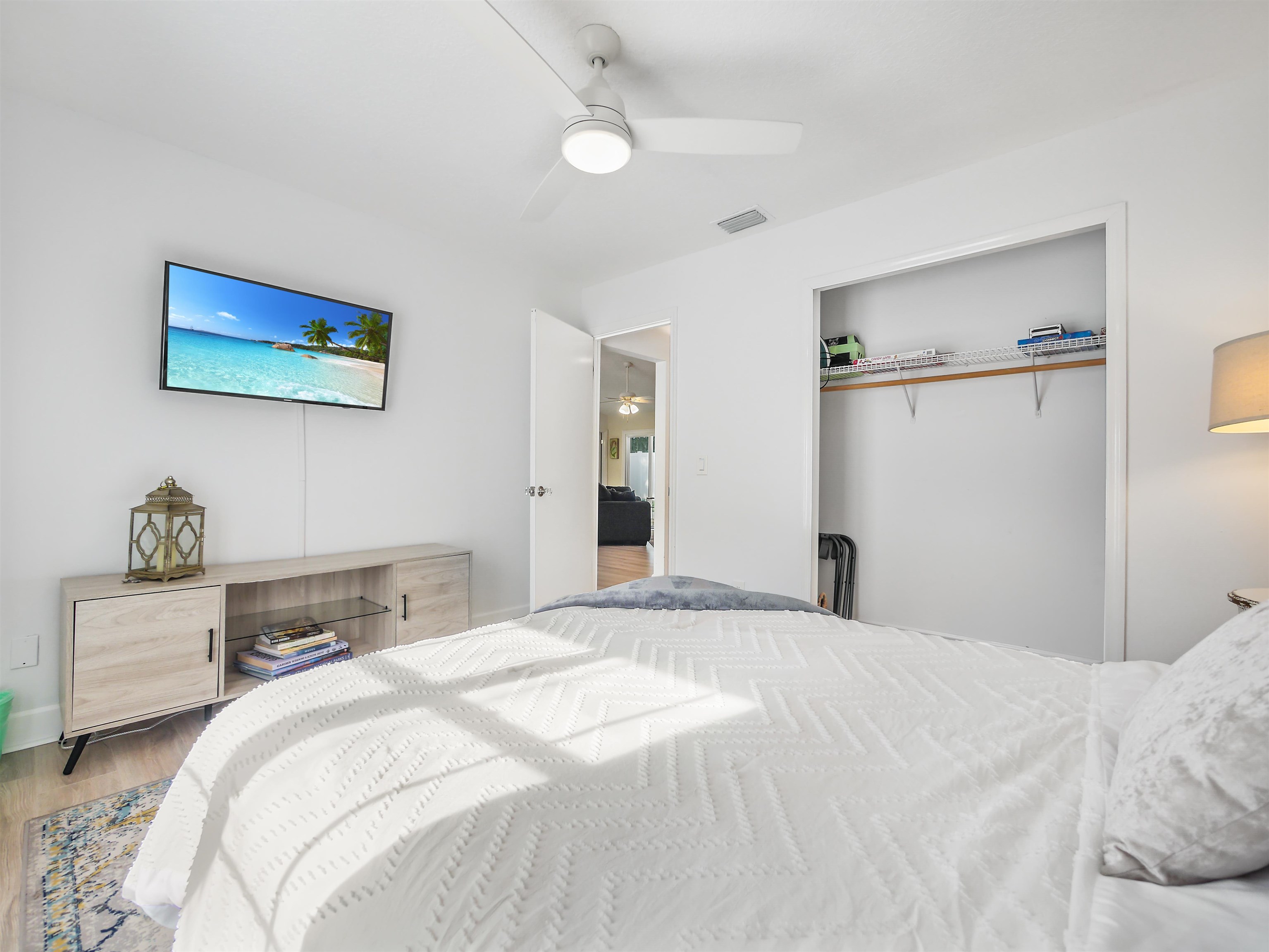140 Hawthorne Road St. Augustine, FL 32086 - Photo 21 of 39 a bedroom with a bed and a cabinets