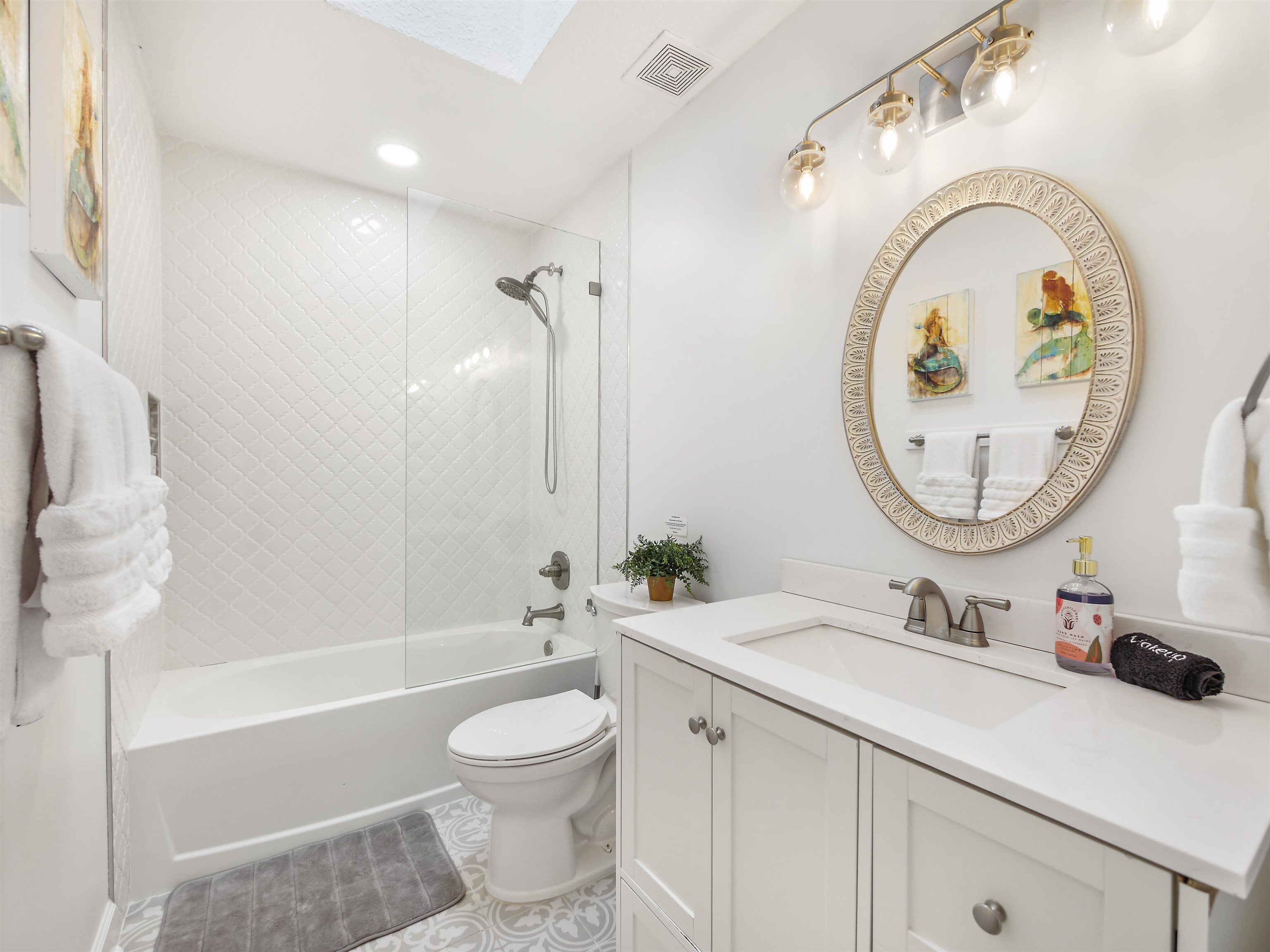 140 Hawthorne Road St. Augustine, FL 32086 - Photo 22 of 39 a bathroom with a toilet a sink and a mirror