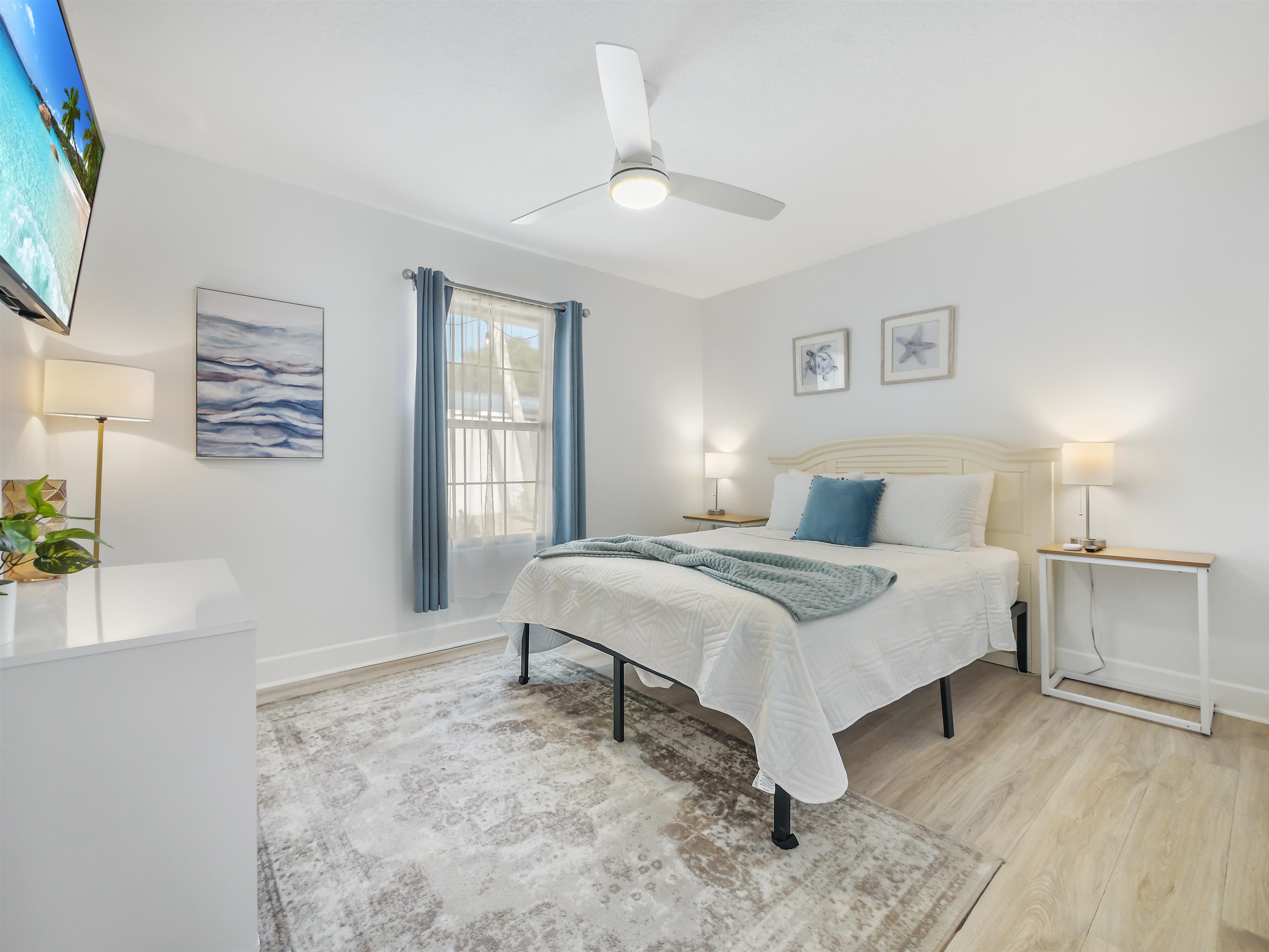 140 Hawthorne Road St. Augustine, FL 32086 - Photo 23 of 39 a bedroom with a bed and a flat screen tv