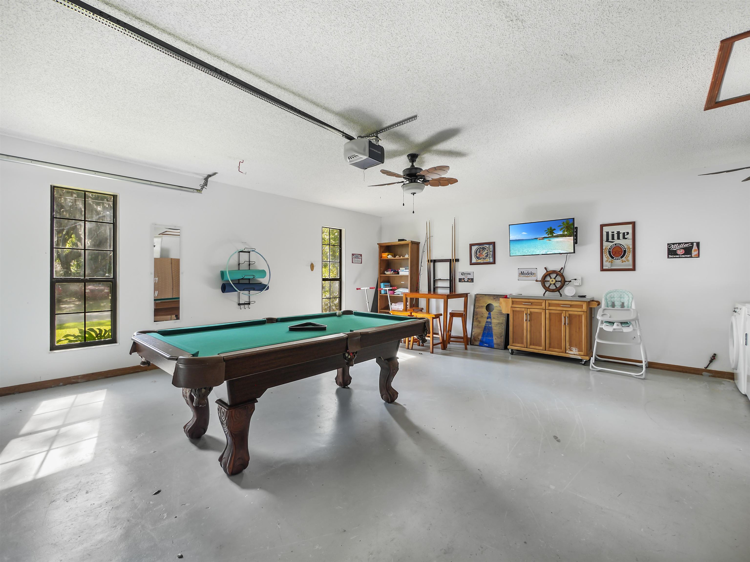 140 Hawthorne Road St. Augustine, FL 32086 - Photo 26 of 39 a room with pool table and windows