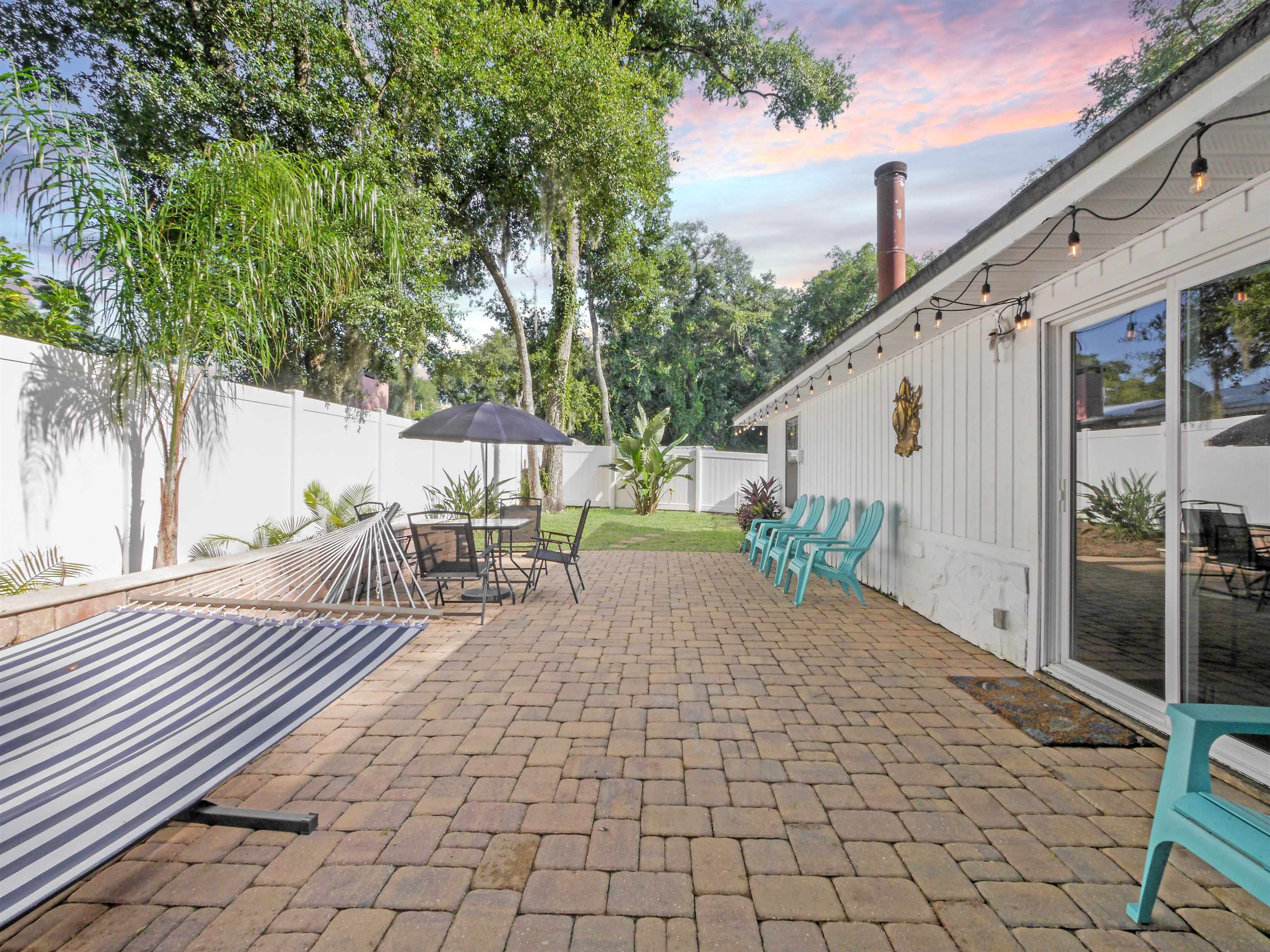 140 Hawthorne Road St. Augustine, FL 32086 - Photo 28 of 39 a view of a backyard with sitting area