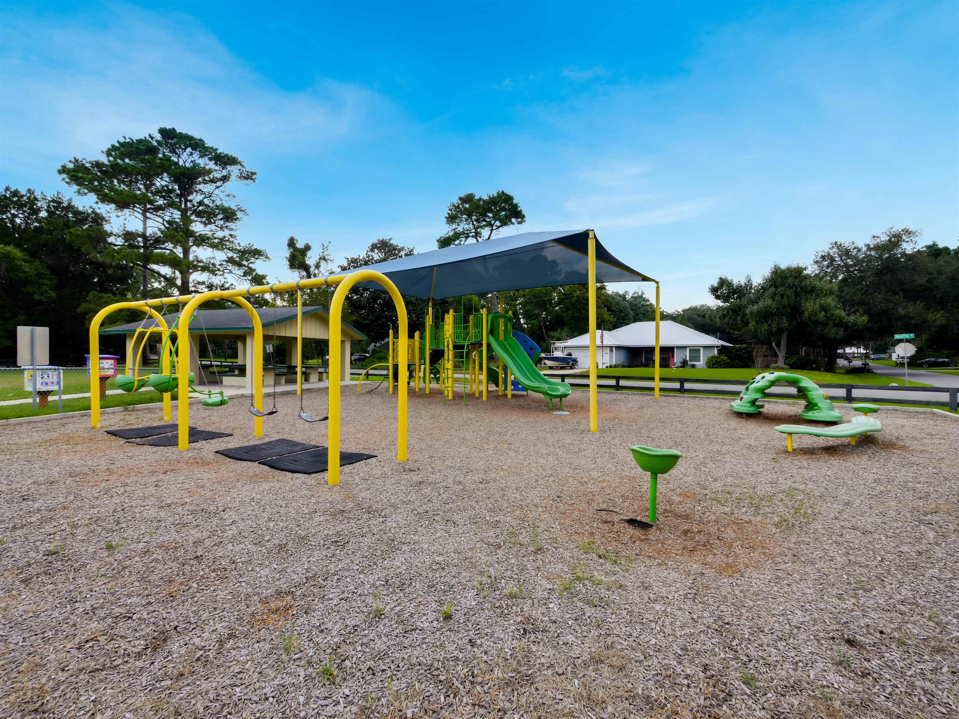 140 Hawthorne Road St. Augustine, FL 32086 - Photo 36 of 39 a childrens park with lots of swings and slides