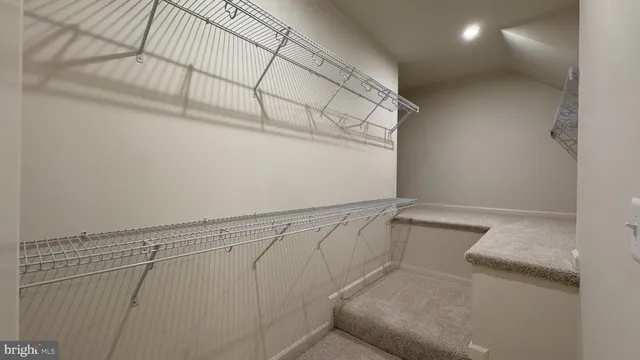 a view of a room with racks on the wall